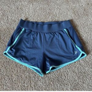 Vintage blue fila sport stretchy work out shorts pockets that zip size small